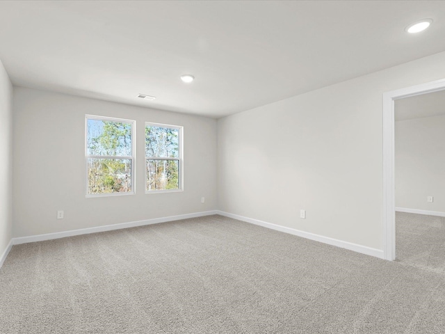 unfurnished room with carpet