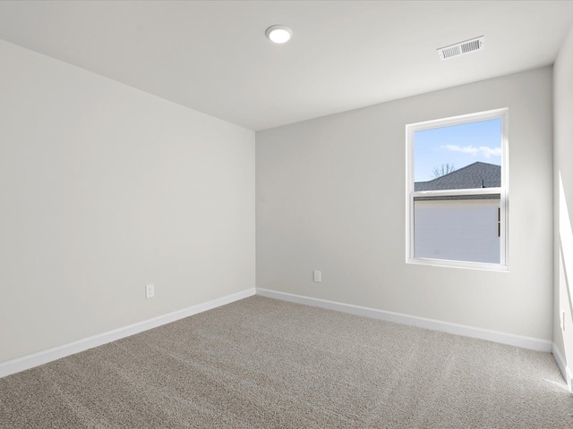 unfurnished room with carpet