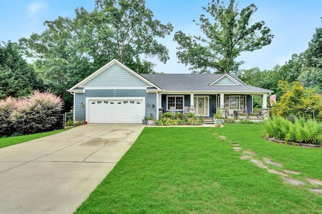 ranch-style house with a garage, a front lawn, and covered porch