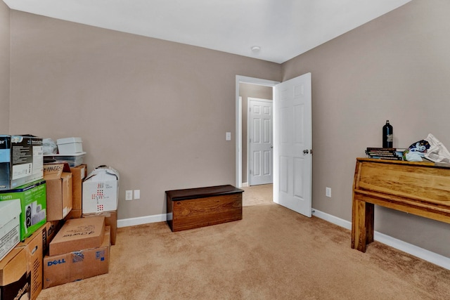 interior space featuring light colored carpet