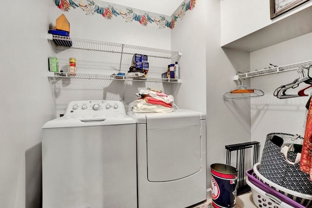 washroom featuring washer and dryer