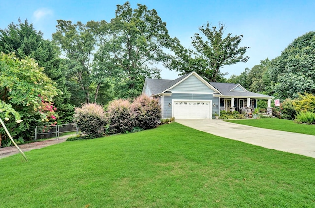 view of front facade featuring a garage and a front lawn