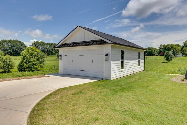 garage featuring a yard