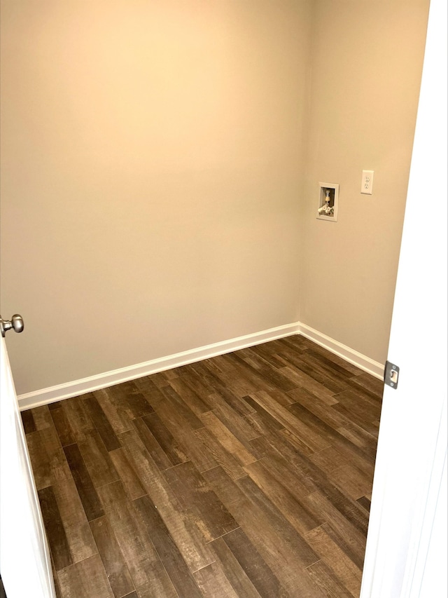 unfurnished room with dark hardwood / wood-style floors