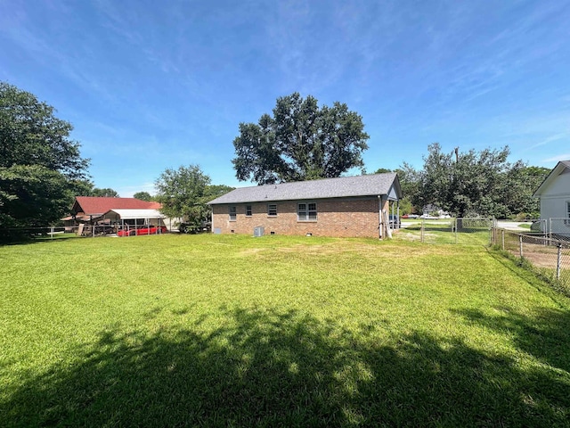 view of yard with fence