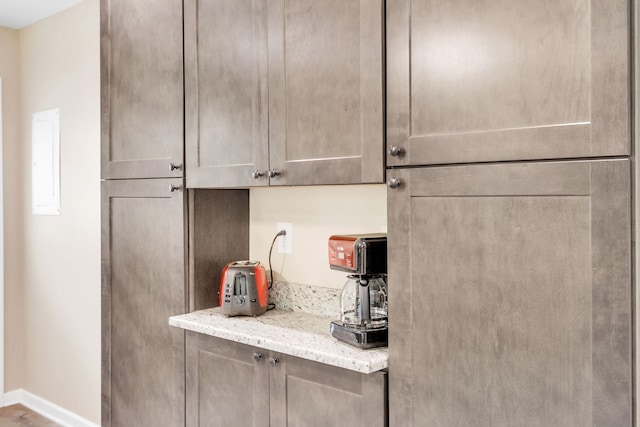 kitchen featuring light stone counters