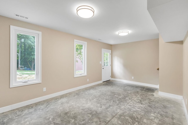 empty room featuring concrete flooring