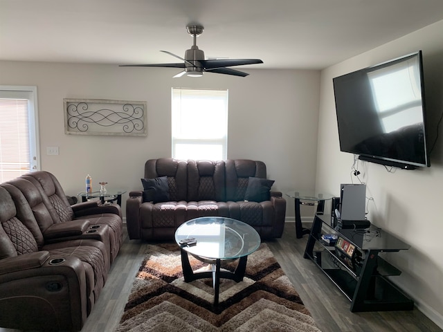 living room with hardwood / wood-style flooring and ceiling fan