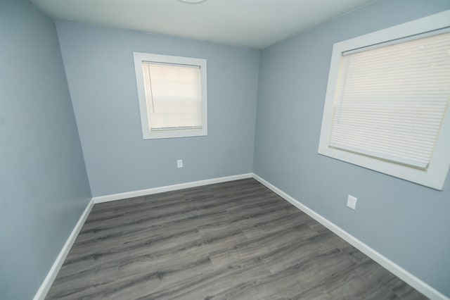 spare room featuring hardwood / wood-style flooring