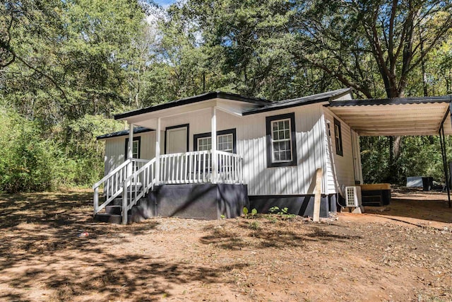 view of front of house with a carport