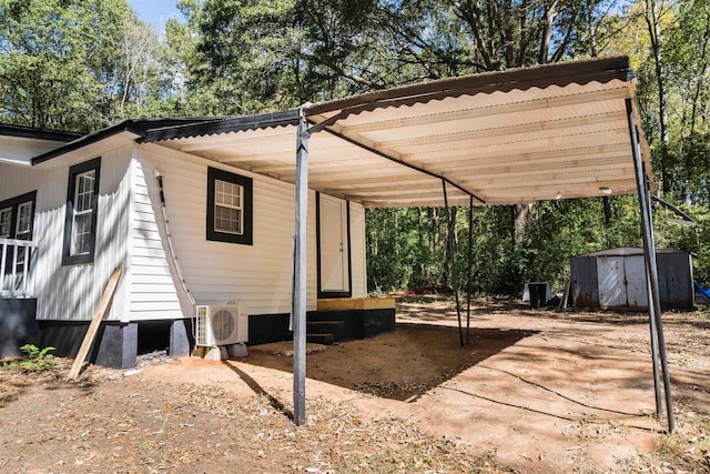 exterior space featuring a shed and a carport