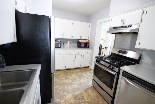 kitchen with white cabinetry, appliances with stainless steel finishes, and sink