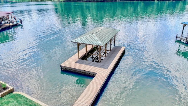 dock area featuring a water view