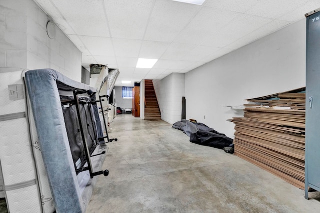 workout area with a drop ceiling