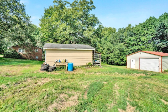 view of yard with an outdoor structure and a garage