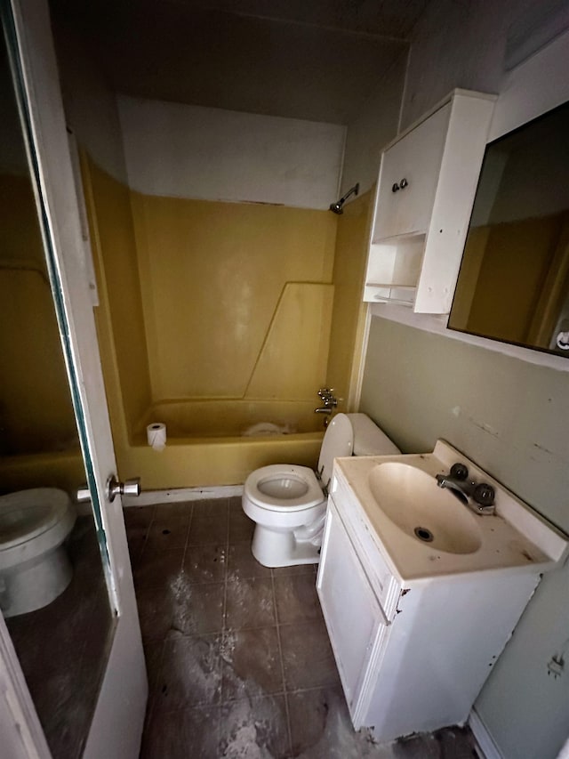 full bathroom with tile patterned floors, vanity, shower / bathing tub combination, and toilet