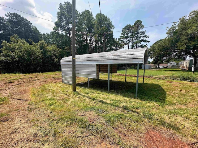 view of yard with a carport