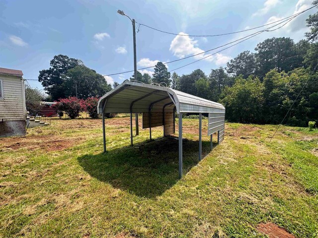 view of yard featuring a carport