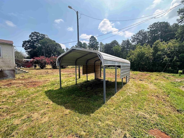 view of yard with a carport