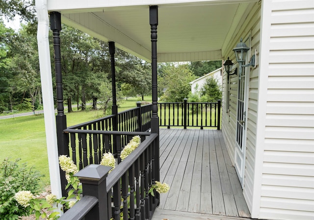 deck featuring a yard