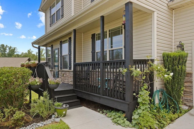 property entrance with covered porch