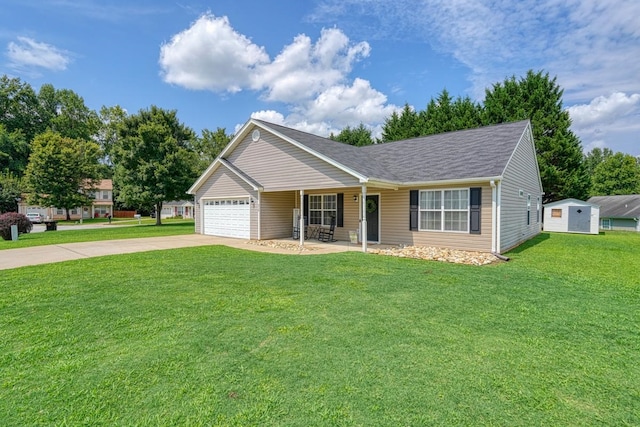 ranch-style house featuring a garage and a front yard