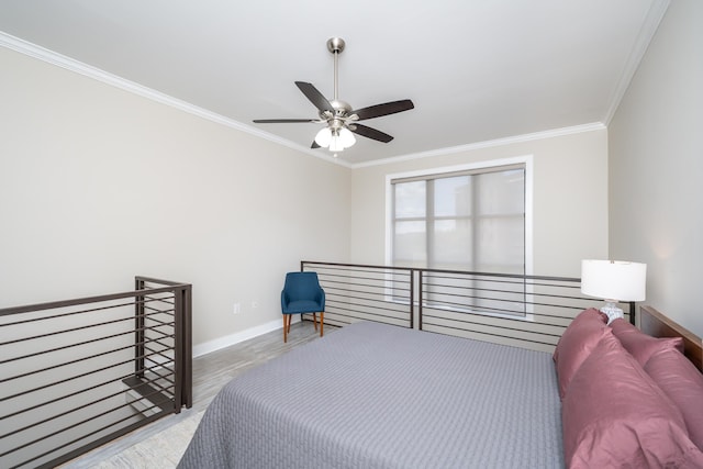 bedroom with ceiling fan and ornamental molding