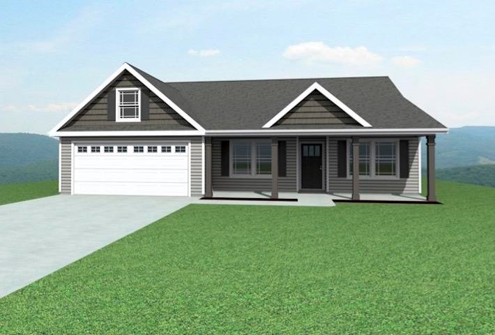 view of front facade with a front yard, a garage, and covered porch