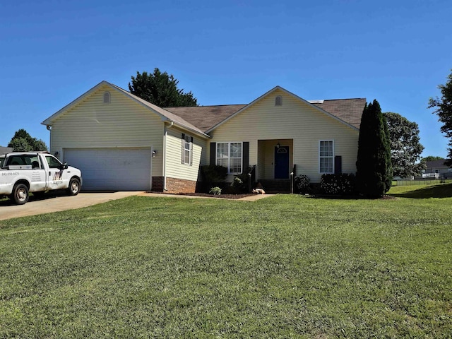 single story home featuring a garage, a front yard, and concrete driveway