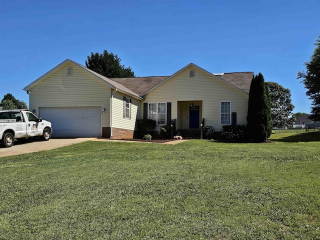 ranch-style home with a garage, a front yard, and concrete driveway