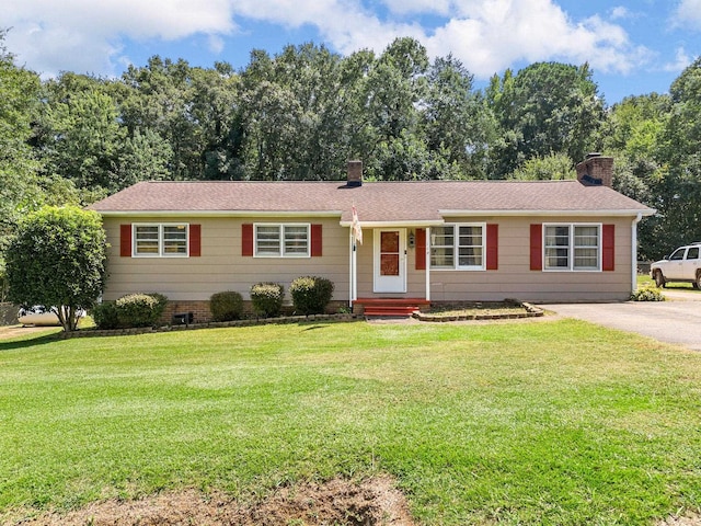 single story home with a front yard