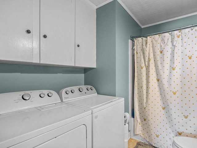 laundry area featuring a textured ceiling, crown molding, and washing machine and clothes dryer