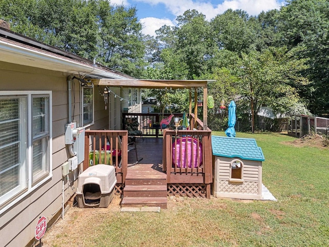 wooden terrace with a lawn