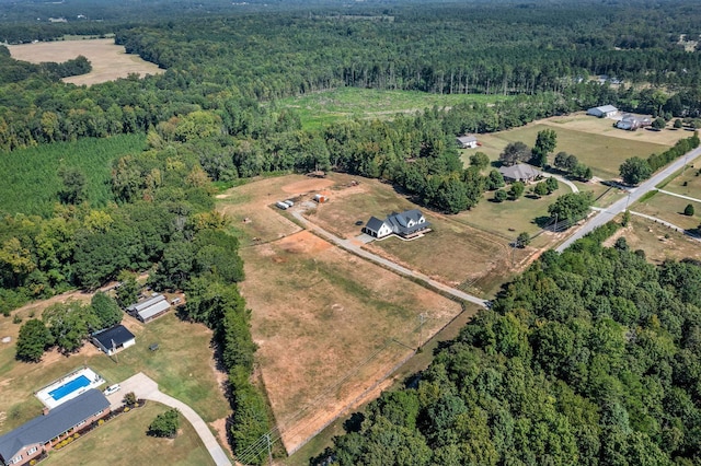 aerial view with a forest view and a rural view