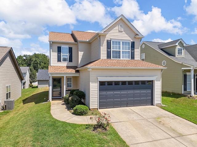 view of front property with a garage, a front yard, and cooling unit