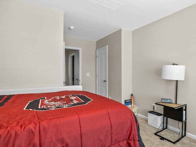 bedroom with light colored carpet