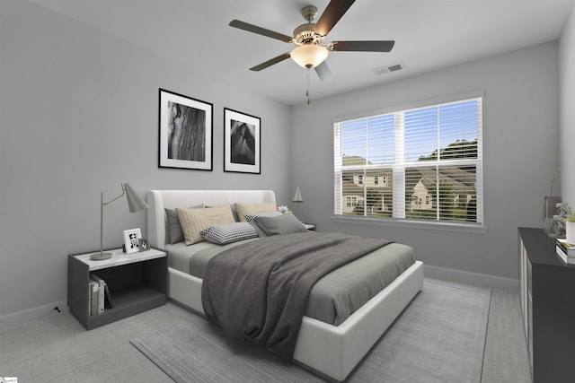 bedroom featuring a ceiling fan, visible vents, and baseboards