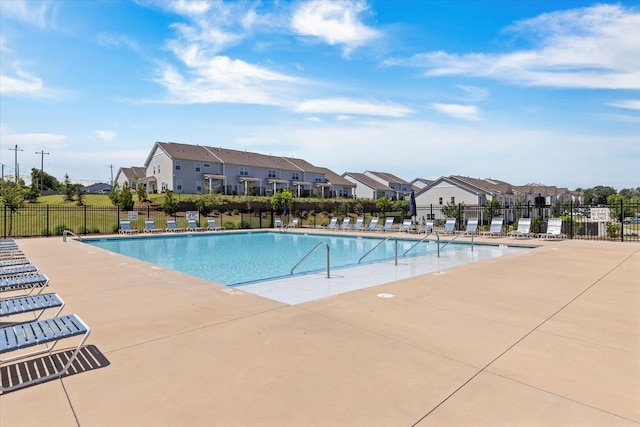 view of pool featuring a patio