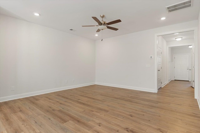 unfurnished room featuring ceiling fan and light hardwood / wood-style floors