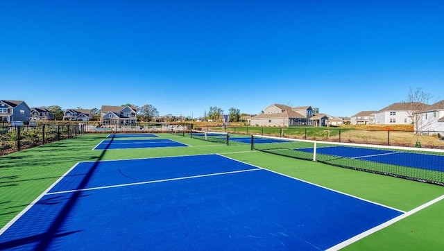 view of tennis court with basketball court