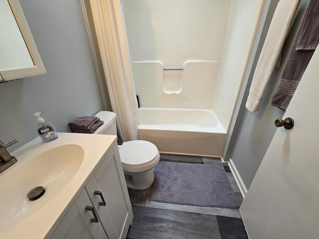 full bathroom featuring vanity, toilet, and shower / bathtub combination