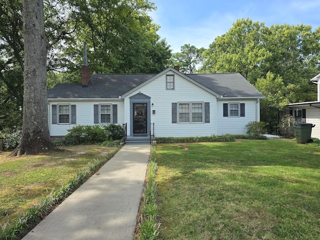 single story home with a front yard