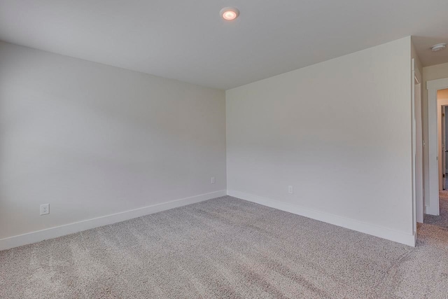 spare room with carpet floors