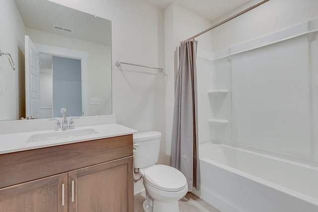 full bathroom featuring vanity, toilet, and shower / tub combo