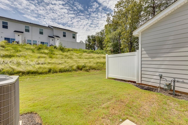 view of yard featuring central AC unit