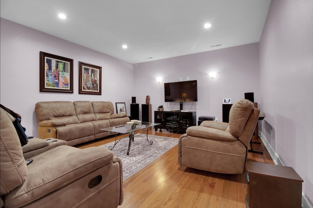 living room with light hardwood / wood-style flooring