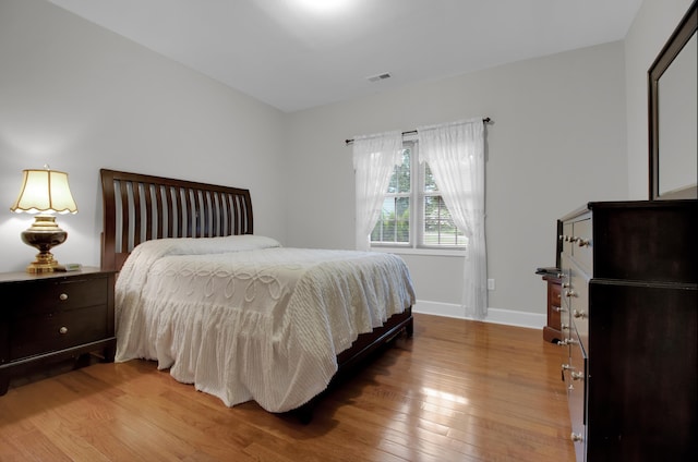 bedroom featuring light wood-type flooring