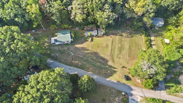 birds eye view of property with a rural view