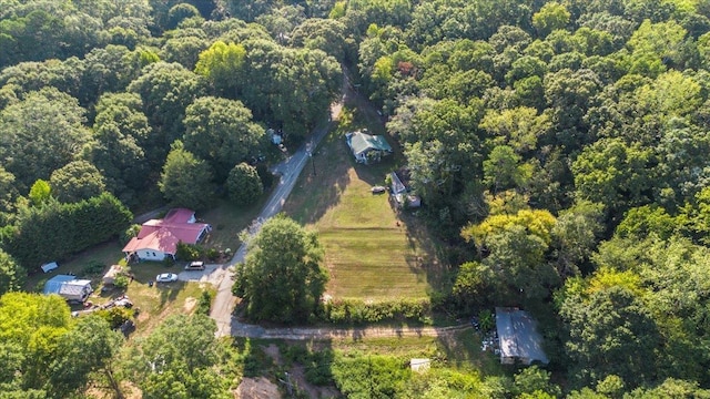 aerial view with a wooded view