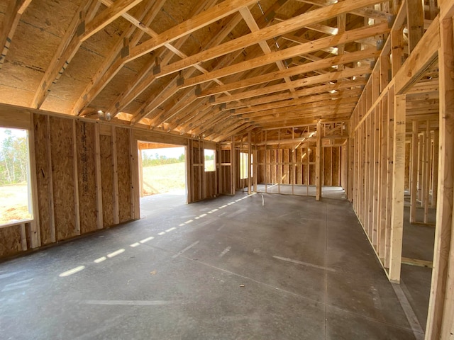 misc room with lofted ceiling